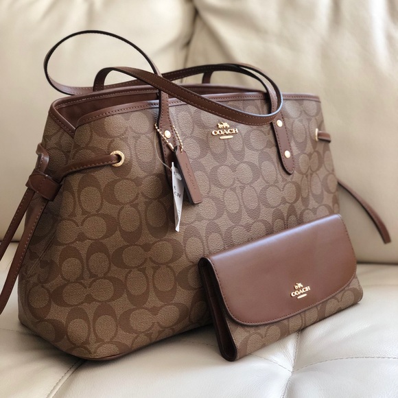 drawstring carryall in signature canvas coach